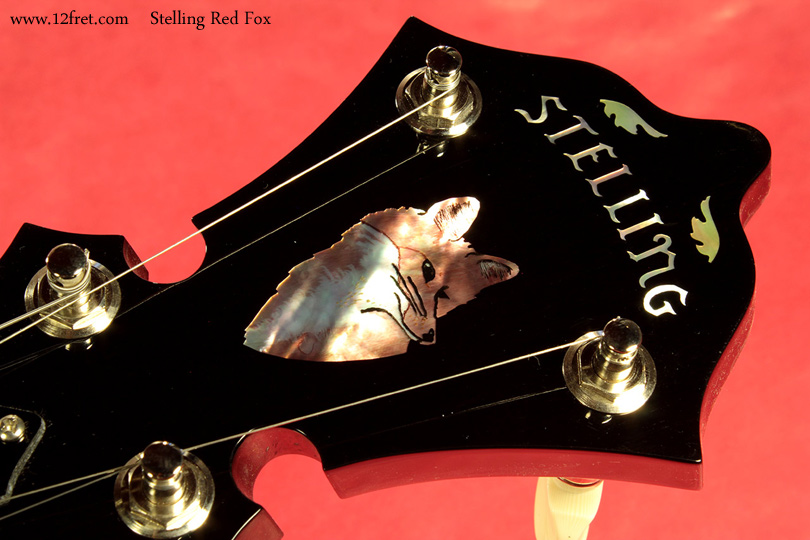 The beautiful Stelling Red Fox banjo is a new model, another superb example of Geoff Stelling's craftsmanship.  Inspired by master banjoist Bill Emerson, the Red Fox features Stelling's unique bronze 'Wedge Fit' tone ring fitted to a Tony Pass 'Lost Timbre' block rim. The Red Fox inlay on the headstock and abalone maple leaf inlay on the fingerboard help make this fine instrument really quite fetching.